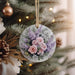 a close up of a christmas ornament on a tree