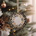 a christmas ornament hanging from a christmas tree