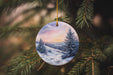 a christmas ornament hanging from a christmas tree