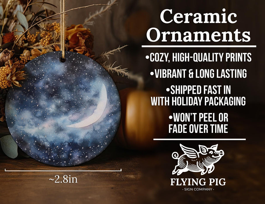 a ceramic ornament with a crescent and stars on it