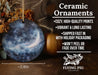 a ceramic ornament with a crescent and stars on it