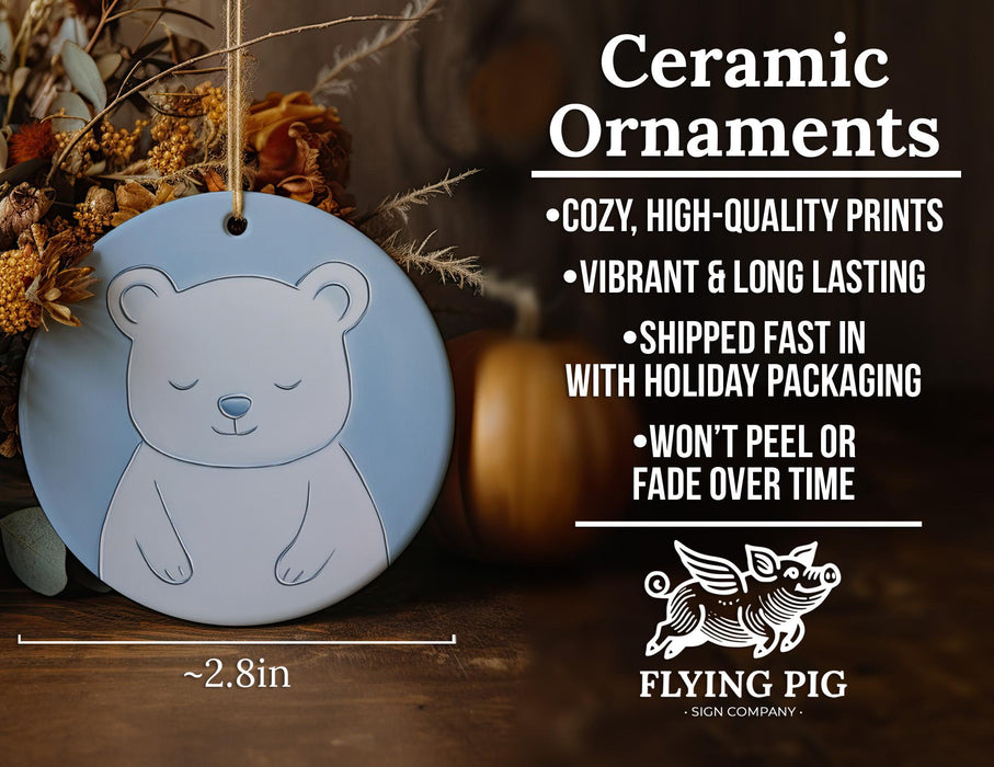 a ceramic ornament with a bear on it