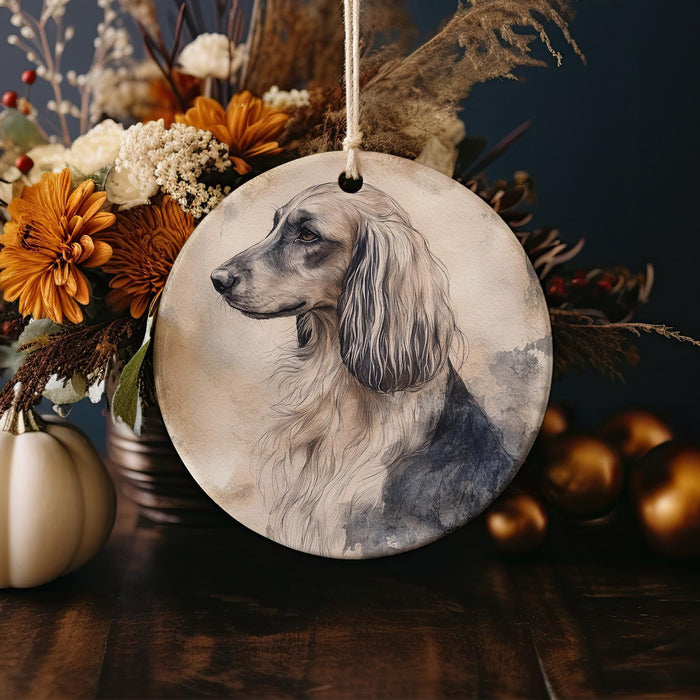 a picture of a dog on a round ornament