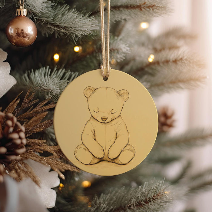 a christmas ornament hanging from a christmas tree