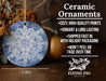 a ceramic ornament hanging on a wooden table