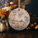 a white horse ornament sitting on top of a wooden table