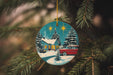 a christmas ornament hanging from a christmas tree