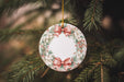 a christmas ornament hanging from a christmas tree
