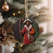 a christmas ornament hanging from a christmas tree