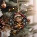 a christmas ornament hanging from a christmas tree