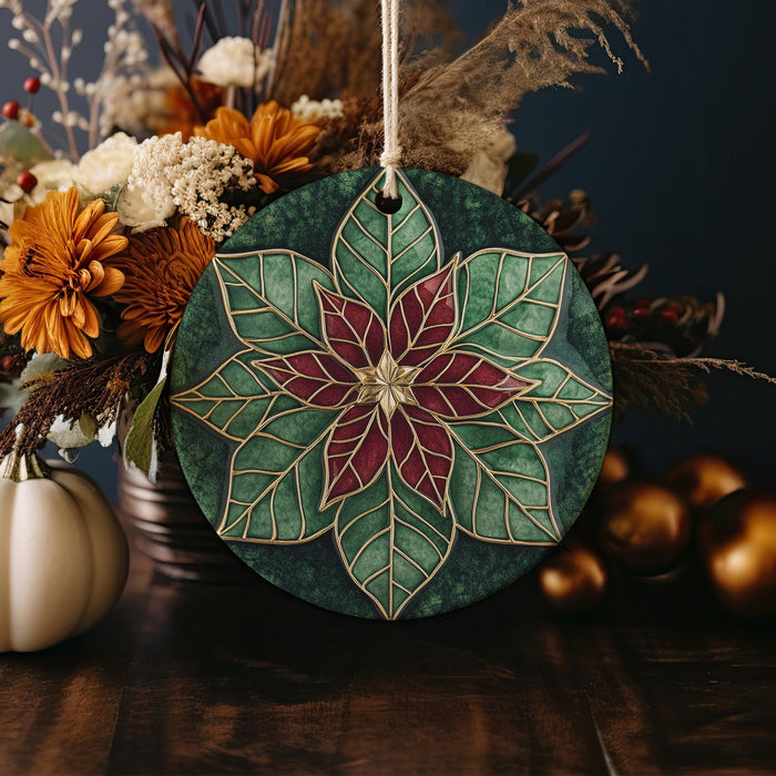a ceramic ornament with a flower design on it