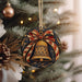 a christmas ornament hanging from a christmas tree