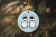 a blue ornament with a pair of shoes on it