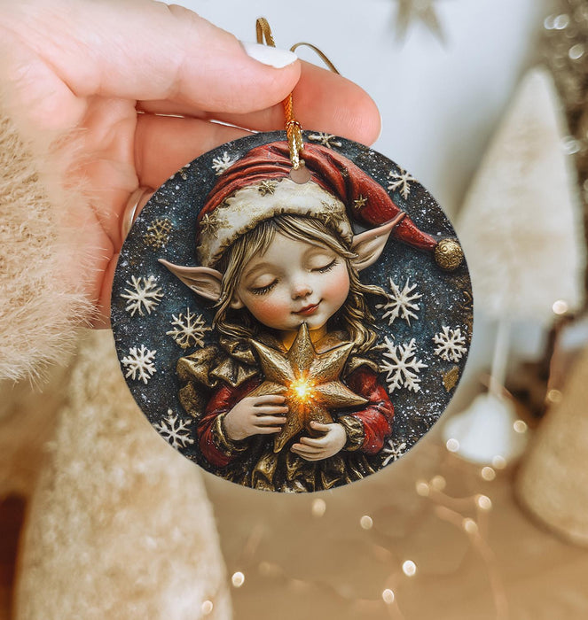 a person holding a christmas ornament in their hand