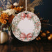 a white plate with a red bow on it
