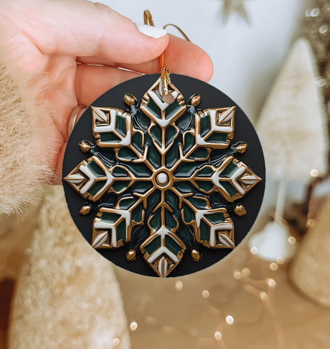 a person holding a christmas ornament in their hand