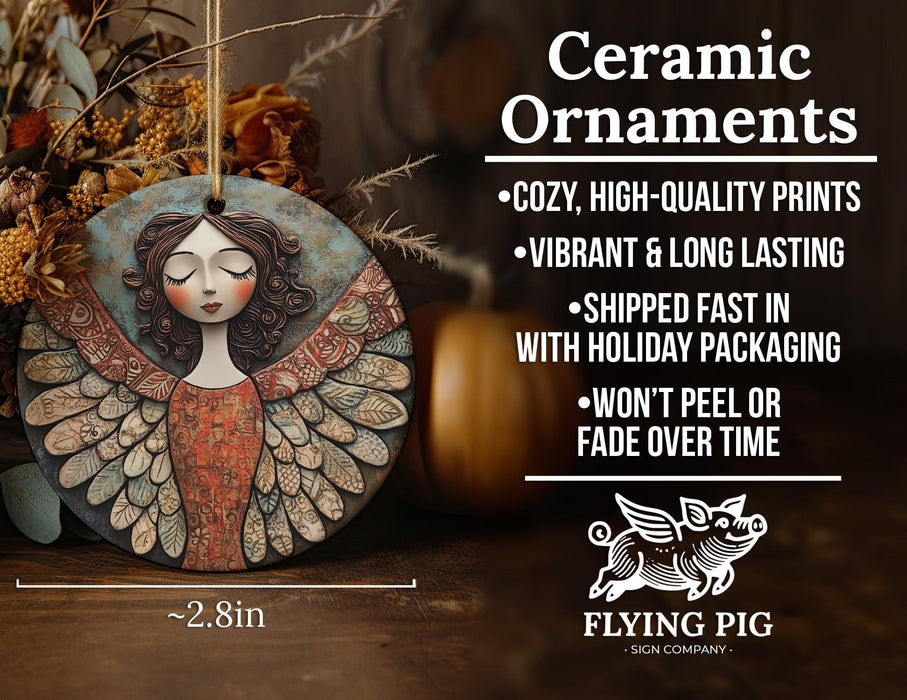 a ceramic ornament with a picture of an angel