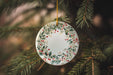 a christmas ornament hanging from a tree