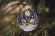 a christmas ornament hanging from a christmas tree