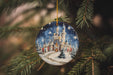 a christmas ornament hanging from a christmas tree