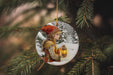 a glass ornament hanging from a christmas tree