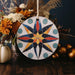 a ceramic ornament with a star design on it