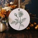 a white plate with a drawing of a rose on it