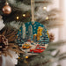 a christmas ornament hanging from a christmas tree