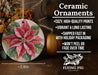a ceramic ornament with a poinsetti on it
