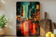 a painting of a city street at night