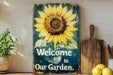 a welcome to our garden sign on a shelf