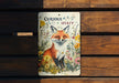 a book with a picture of a fox on it