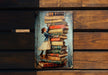 a painting of a girl leaning on a stack of books