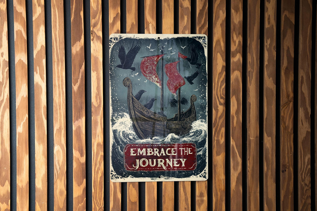 a sign on a wooden wall that says embrace the journey