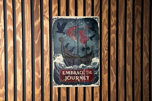 a sign on a wooden wall that says embrace the journey