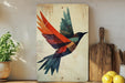 a painting of a bird on a wall