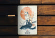 a picture of a fox sitting on top of a wooden bench