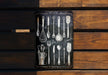 a chalkboard with spoons and spoons drawn on it