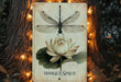 a picture of a dragonfly sitting on top of a flower