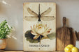 a picture of a dragonfly sitting on top of a flower