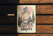 a sign on the side of a wooden bench