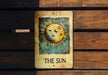 a picture of a sun on a wooden wall