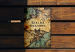 a book sitting on top of a wooden bench