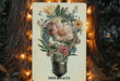a picture of a light bulb with flowers in it