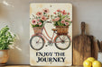 a picture of a bicycle with flowers in a basket