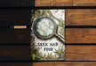 a book with a magnifying glass on top of it