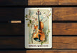 a picture of a violin with flowers on it