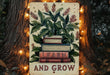 a sign that says learn and grow next to a tree
