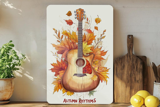 a picture of a guitar with autumn leaves on it