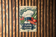 a sign on a wooden wall that says flavor creator